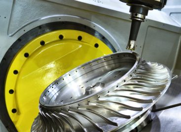 Aerospace worker using PSI Dragon’s MicroAbrasive Sheets for precision surface finishing on aircraft components.
