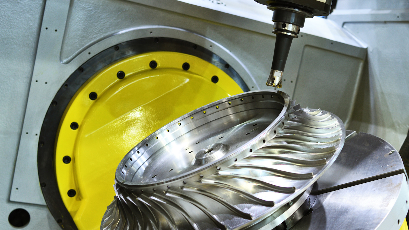 Aerospace worker using PSI Dragon’s MicroAbrasive Sheets for precision surface finishing on aircraft components.